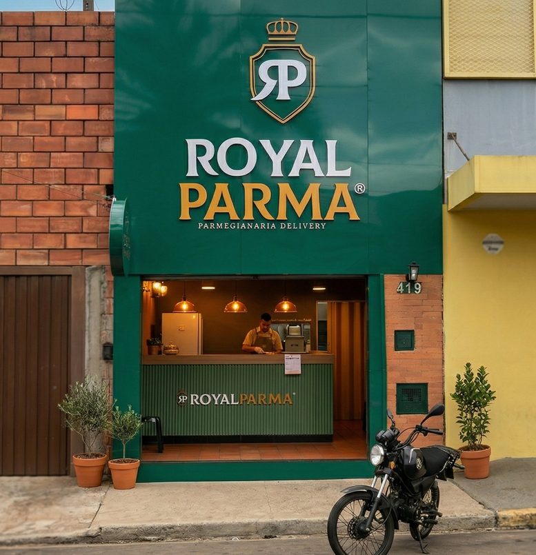 Fachada de uma unidade: pintura verde, tijolo aparente, letreiro com o brasão e o nome, balcão de retirada visível pela porta e uma moto de entrega estacionada